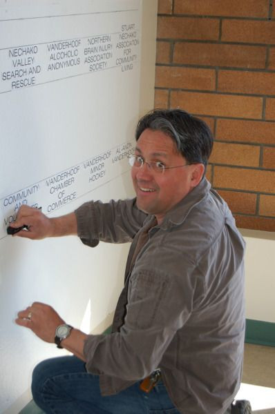 Reg setting up the Volunteeer Board